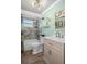 Bathroom featuring tub, shower, storage shelves and modern fixtures at 8021 Wildflower Row, Hudson, FL 34667