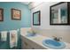 Charming bathroom with dual sinks and unique décor for added character at 8021 Wildflower Row, Hudson, FL 34667