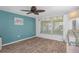 Bright bedroom with ample natural light and neutral walls create a relaxing atmosphere at 8021 Wildflower Row, Hudson, FL 34667