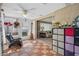 Bright sunroom with tile flooring, providing a versatile and inviting space at 8021 Wildflower Row, Hudson, FL 34667