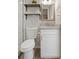 Modern bathroom featuring a granite vanity, marble tiled shower, and updated fixtures at 9111 Greenbriar Ln, Port Richey, FL 34668