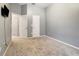 Neutral bedroom showcasing its carpet, color scheme, and open layout at 9527 Southern Charm Cir, Brooksville, FL 34613