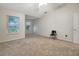 Bright bedroom features neutral carpeting, large windows, and ample space at 9527 Southern Charm Cir, Brooksville, FL 34613