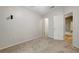 Neutral bedroom showcasing the neutral color scheme and plush carpeting at 9527 Southern Charm Cir, Brooksville, FL 34613