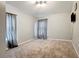 Bedroom featuring gray window treatments and neutral color scheme at 9527 Southern Charm Cir, Brooksville, FL 34613