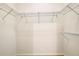 Walk-in closet featuring built-in wire shelving for storage needs at 9527 Southern Charm Cir, Brooksville, FL 34613