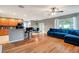 Open concept featuring the kitchen, dining, and living area at 9527 Southern Charm Cir, Brooksville, FL 34613