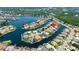 Breathtaking aerial view shows a canal-front home with easy access to the bay and intercoastal waters at 9810 Compass Point Way, Tampa, FL 33615