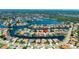 Gorgeous aerial view of a waterfront home with well-manicured landscaping and boating access to open waters at 9810 Compass Point Way, Tampa, FL 33615