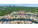 Aerial view highlights a waterfront home with easy boating access to the bay and the Gulf of Mexico at 9810 Compass Point Way, Tampa, FL 33615