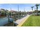Exterior of boat lift at dock for convenient water access; great for boating and enjoying the canal lifestyle at 9810 Compass Point Way, Tampa, FL 33615