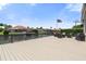 Lovely outdoor deck with waterfront view and outdoor furniture, great for entertaining on a beautiful sunny day at 9810 Compass Point Way, Tampa, FL 33615