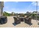 Inviting outdoor space with stylish patio furniture, perfect for relaxing and enjoying the scenic waterfront view at 9810 Compass Point Way, Tampa, FL 33615