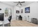 Well-lit home office space featuring a comfortable desk, modern decor, and lots of natural light at 9810 Compass Point Way, Tampa, FL 33615
