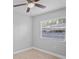 Bedroom featuring wood floors, natural light, and neutral color at 1000 Magnolia Dr, Clearwater, FL 33756