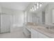 Bright bathroom with shower and separate soaking tub and double sinks at 10344 Tecoma Dr, Trinity, FL 34655