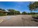 Well-maintained parking lot adjacent to recreational facilities, providing convenient access to amenities at 10344 Tecoma Dr, Trinity, FL 34655