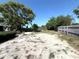 Large lot with ample room and mature trees at 10431 Syringa Ct, Port Richey, FL 34668