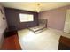 Spacious bedroom featuring ample closet space, natural lighting, and ceiling fan at 10431 Syringa Ct, Port Richey, FL 34668