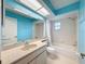 Bright bathroom with a large vanity and tiled shower/bathtub combination at 11141 Sandtrap Dr # 11141, Port Richey, FL 34668