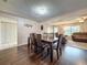 The dining area features an open floor plan to the living room at 11141 Sandtrap Dr # 11141, Port Richey, FL 34668