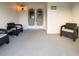 Cozy front porch with seating, perfect for relaxing near the decorative double doors at 11141 Sandtrap Dr # 11141, Port Richey, FL 34668