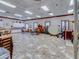 Large activity room with counter space, tables, and seating, perfect for various hobbies and crafts at 11350 Copley Ct, Spring Hill, FL 34609
