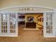 Entrance to Bar & Grill with reception area and views to dark wood bar area at 11350 Copley Ct, Spring Hill, FL 34609
