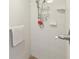 Shower with tile walls and floor with showerhead at 11350 Copley Ct, Spring Hill, FL 34609