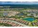 Beautiful aerial view of a Primary-planned community with multiple lakes and lush landscaping throughout the neighborhood at 11611 Callisia Dr, Odessa, FL 33556