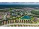 Aerial view showcases the community's lush landscaping and beautiful lakes at 11611 Callisia Dr, Odessa, FL 33556