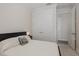 Comfortable bedroom featuring neutral walls and a closet with bi-fold doors at 11611 Callisia Dr, Odessa, FL 33556