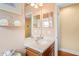 Powder room features a mirror and sink at 12071 Wexford Blvd, Spring Hill, FL 34609