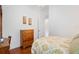 Bright bedroom featuring a double bed and wood dresser at 12071 Wexford Blvd, Spring Hill, FL 34609