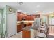 Stylish kitchen with stainless appliances, updated cabinets, and a breakfast bar at 12071 Wexford Blvd, Spring Hill, FL 34609