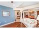 Open concept living room seamlessly connects to the dining area, perfect for entertaining at 12071 Wexford Blvd, Spring Hill, FL 34609