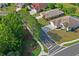 Neighborhood street featuring landscaped yards, sidewalks, and well-maintained homes with mature trees at 12071 Wexford Blvd, Spring Hill, FL 34609