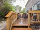 Wooden deck with outdoor furniture, inviting relaxation and enjoyment of the natural surroundings at 12408 Country White Cir, Tampa, FL 33635