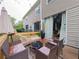 Wooden deck with outdoor seating area, perfect for relaxation and entertaining with great lighting at 12408 Country White Cir, Tampa, FL 33635
