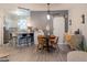 Charming dining area with a stylish table and chairs adjacent to a modern kitchen, offering a seamless dining experience at 12408 Country White Cir, Tampa, FL 33635