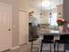 Modern kitchen featuring stainless steel appliances, granite countertops, and ample cabinet space, perfect for culinary enthusiasts at 12408 Country White Cir, Tampa, FL 33635