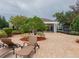 Community area with chairs, lounge seating and shade at 12408 Country White Cir, Tampa, FL 33635