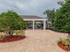Community pavilion with outdoor seating, brick pavers, and mature landscaping at 12408 Country White Cir, Tampa, FL 33635