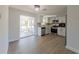 Bright kitchen with new white cabinets, stainless steel appliances, and ample counter space at 1249 Honor Dr, Holiday, FL 34690