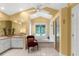 Bright bathroom featuring a tub, shower, and a stained glass window at 1253 Culbreath Rd, Brooksville, FL 34602