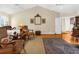 Bedroom with neutral paint, ceiling fans, wood floors, and traditional decor at 1253 Culbreath Rd, Brooksville, FL 34602