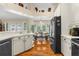 Spacious kitchen with dining area and large windows provides abundant natural light and a modern feel at 1253 Culbreath Rd, Brooksville, FL 34602