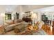 Comfortable living room with hardwood floors and views into the formal dining room at 1253 Culbreath Rd, Brooksville, FL 34602