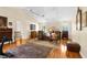 Spacious main bedroom featuring hardwood floors, ceiling fans, and natural light at 1253 Culbreath Rd, Brooksville, FL 34602