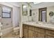 Bright bathroom featuring a vanity and a bathtub-shower combination at 12722 Oak Tree Dr, Hudson, FL 34667
